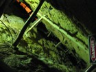 IMG_4075  A dug-out gold seam that was just a few feet wide and at 45 as shown.  Hard work!.JPG