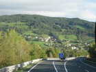 IMG_2795 Turnoff toward Lienz.  On the sign, Mallnitz has an auto-train terminal.JPG
